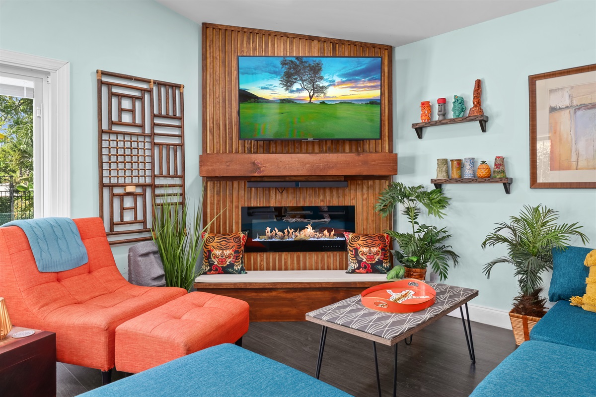 Cozy living room with comfortable seating, perfect for relaxing and enjoying quality time, featuring a fireplace to enhance the ambiance.