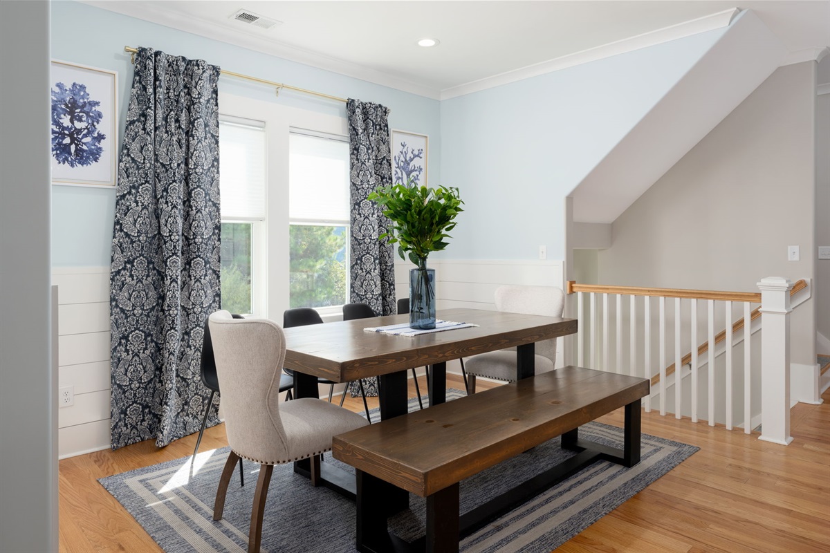 Gather around the dining table for shared meals, games, and long conversations — a favorite spot for groups and families.