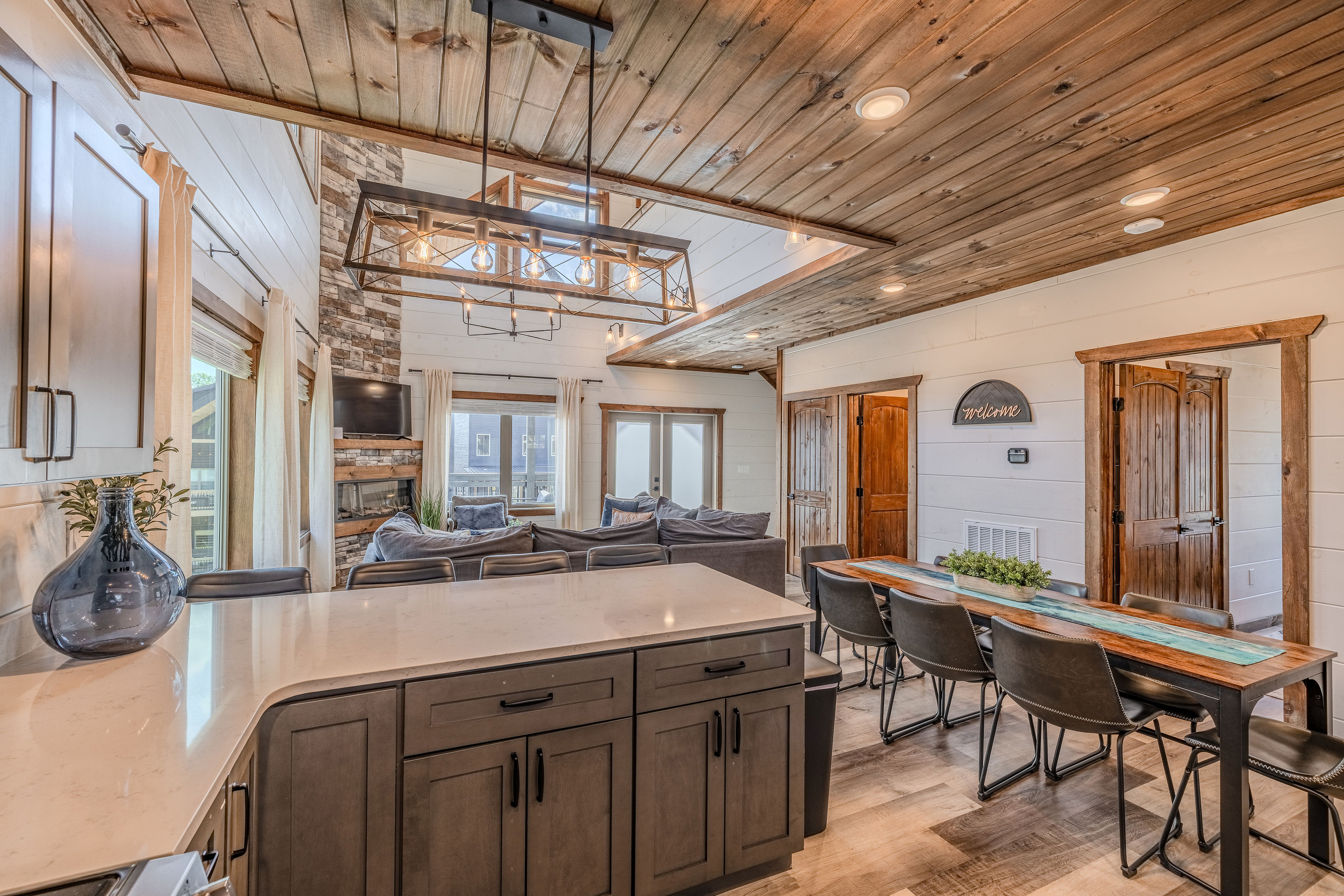 A spacious island provides generous preparation and serving space.