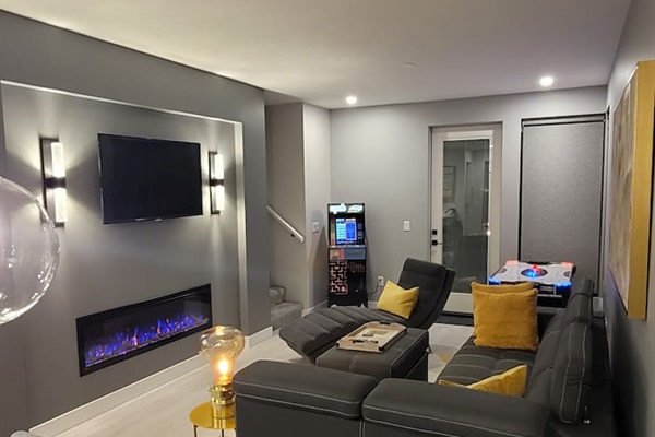 Pull out sofa bed, Air Hockey, Pac Man, Chromecast TV, Fireplace