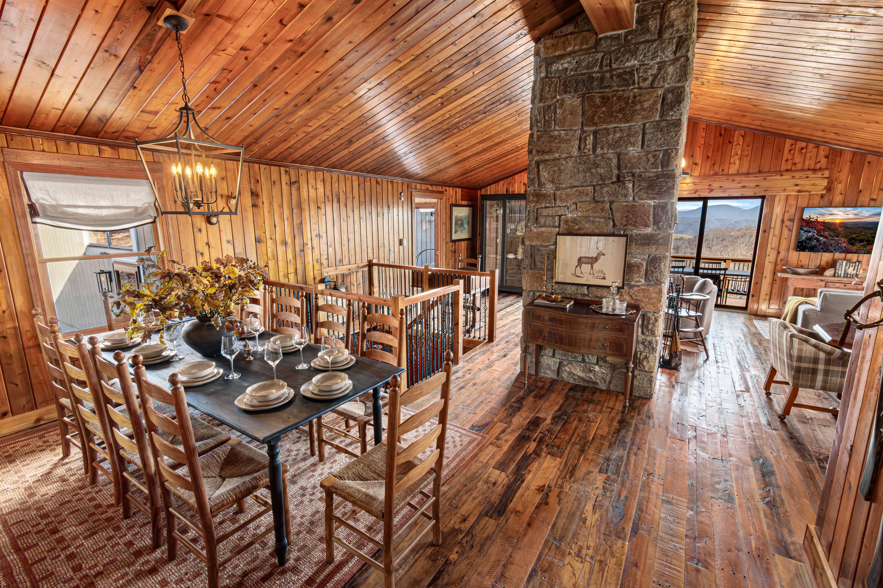 Once divided into three small, awkwardly angled rooms, this space was completely opened up to create a warm, inviting gathering area that flows seamlessly between living and dining.