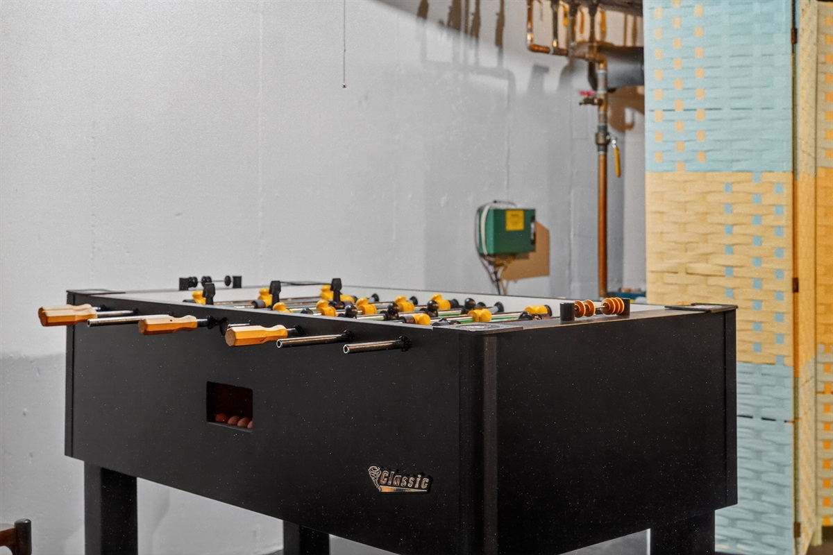 Enjoy friendly competition in the basement with foosball!