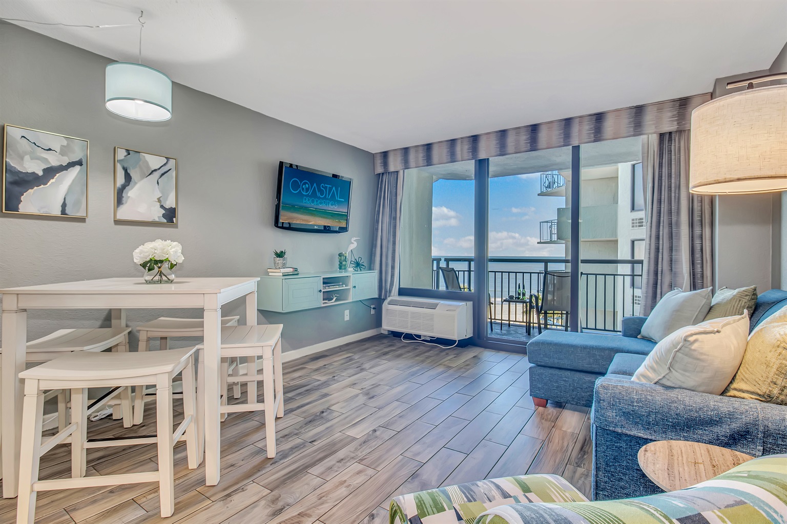 Engage in oceanview conversations from the comfort of the couch, where the living area is thoughtfully arranged to encourage socializing while savoring the sea vistas.