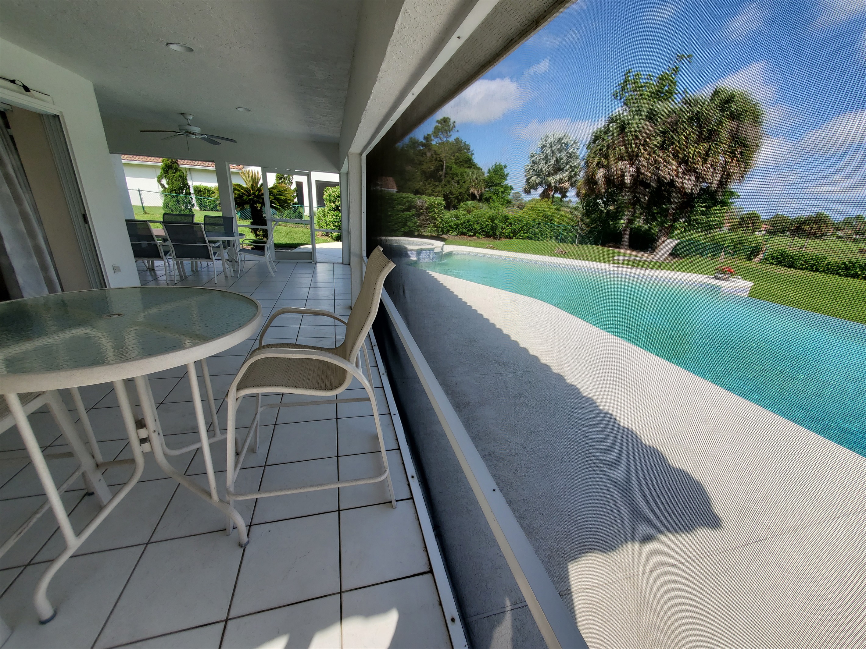 Full view of lanai and pool deck