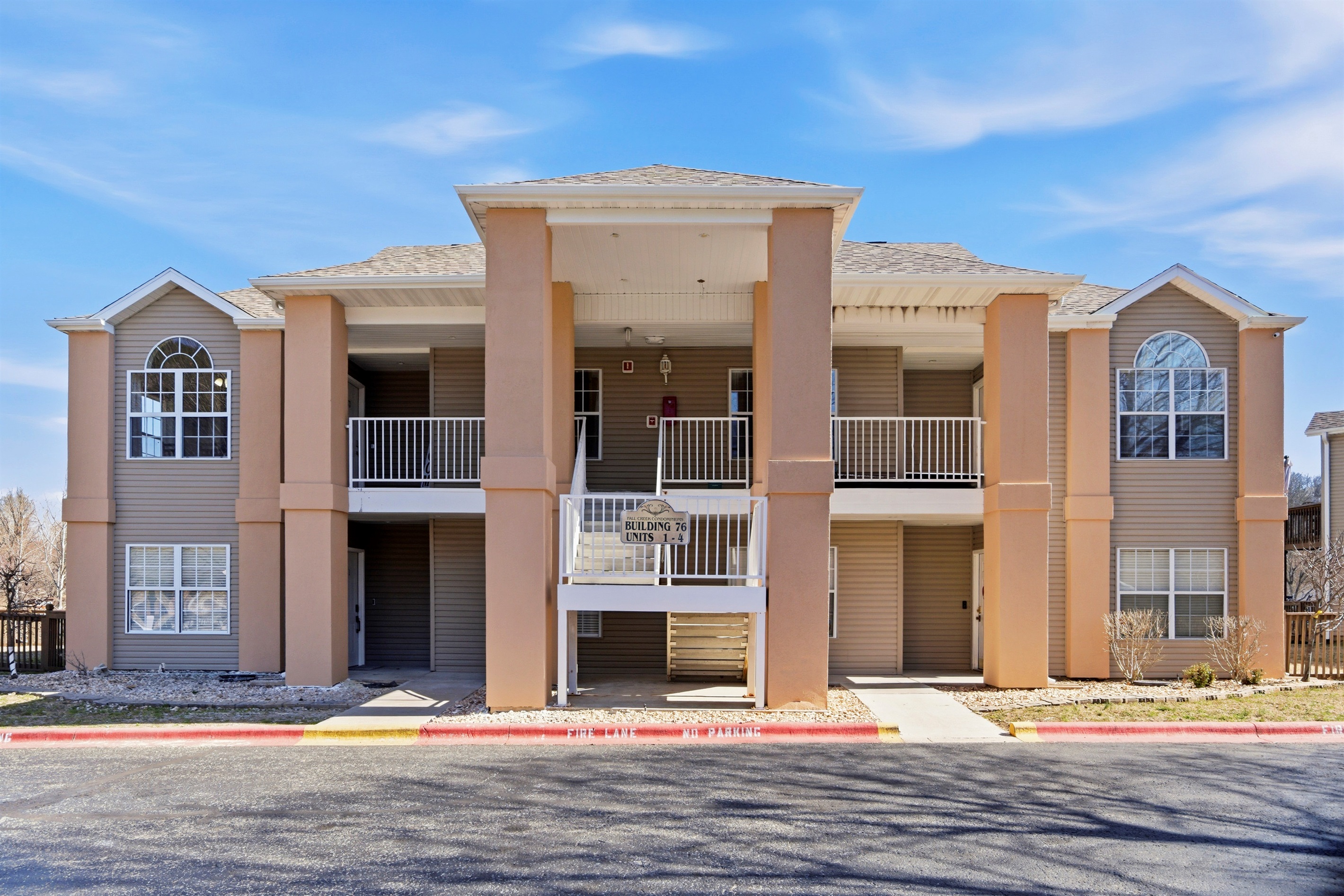 The unit is a second floor unit and is the top left of thes photo.