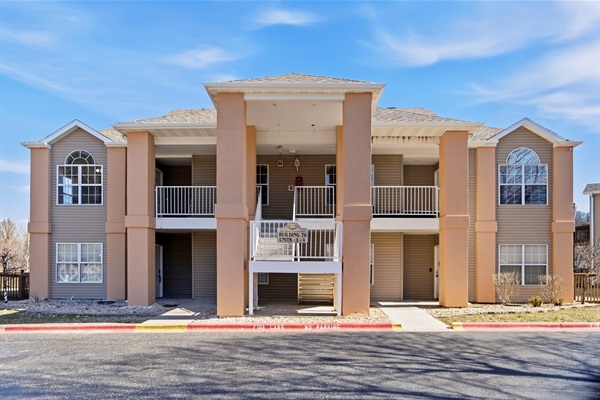 The unit is a second floor unit and is the top left of thes photo.
