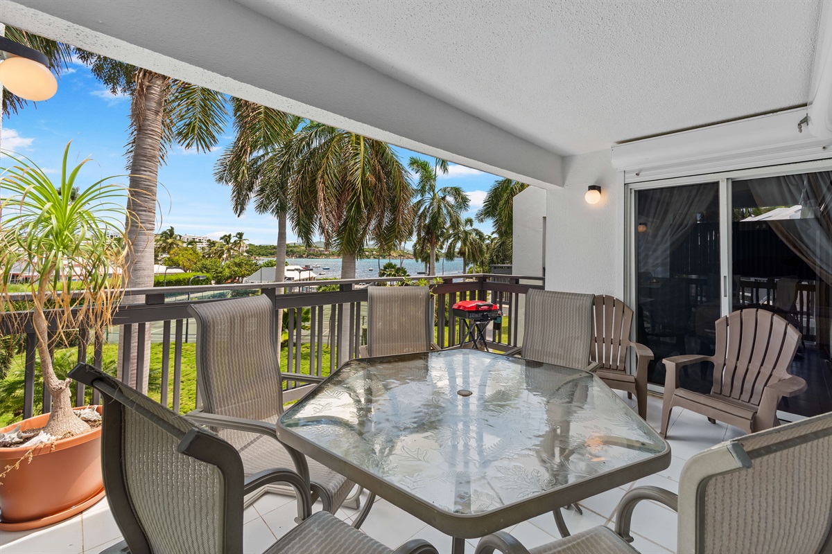 Outdoor dining area on the porch with water views