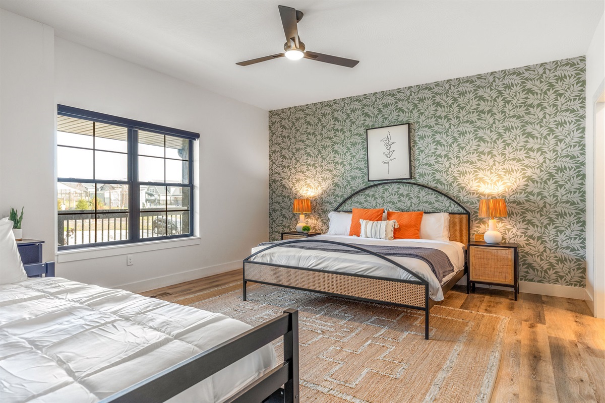 Main level King bedroom #2 w/ daybed and trundle, ensuite bath