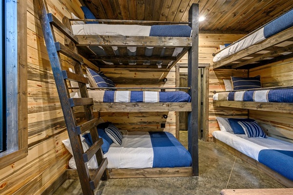 The Game Room also doubles as the Bunk Room with Triple Full Size Bunks and Triple Twin Size Bunks