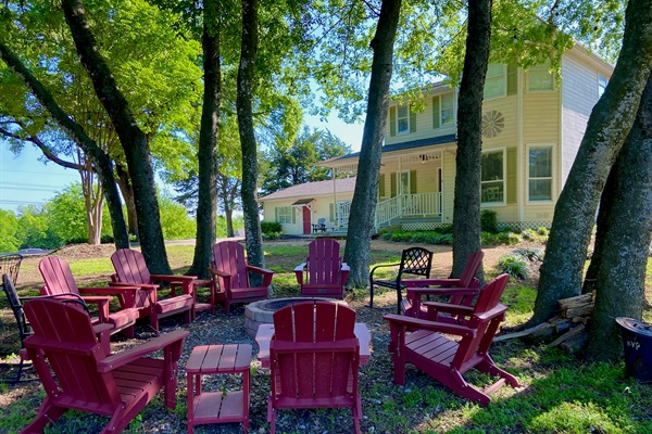 Fire pit with lots of Adirondack seating