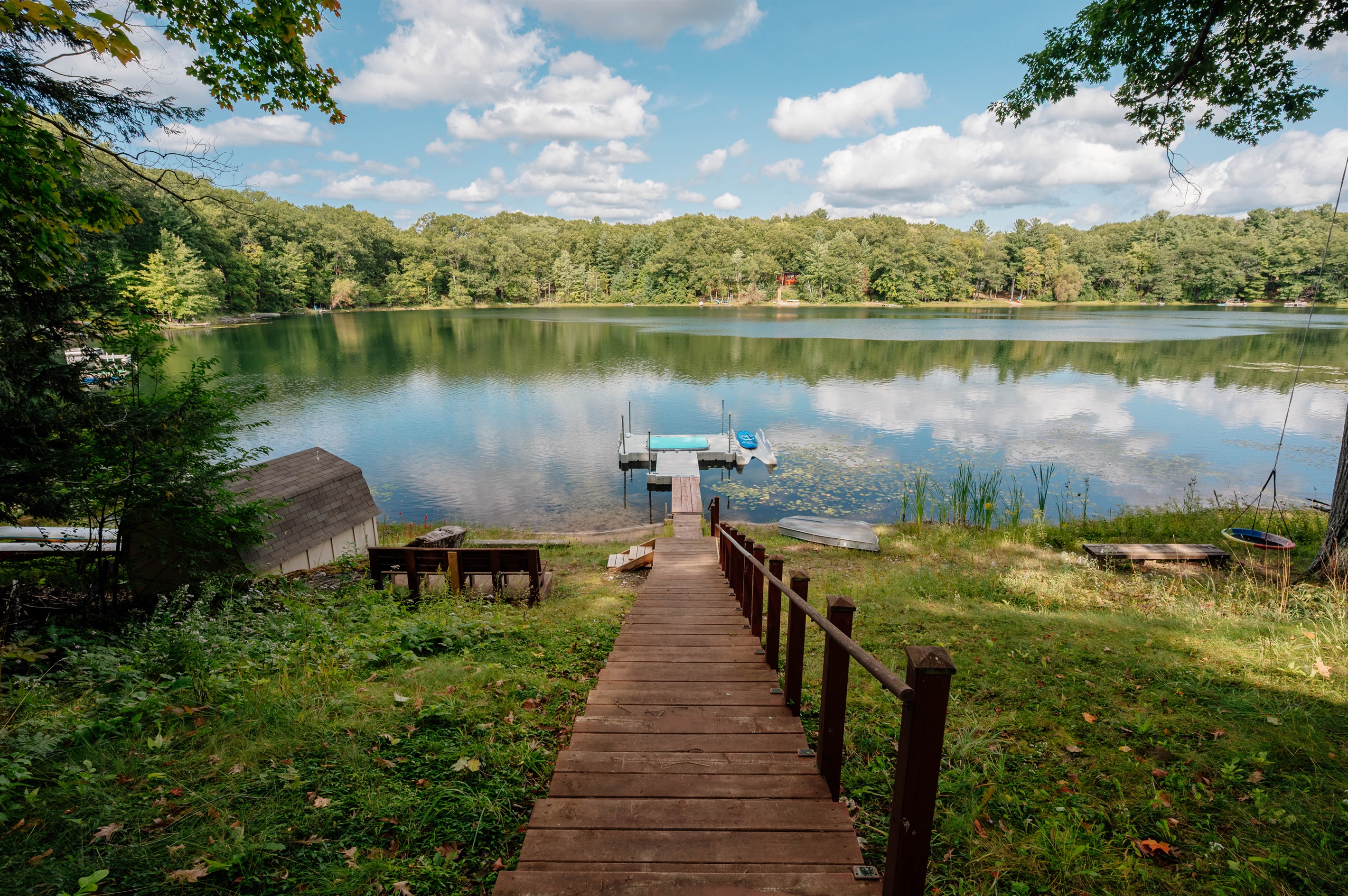 Private dock with seating and direct lake access