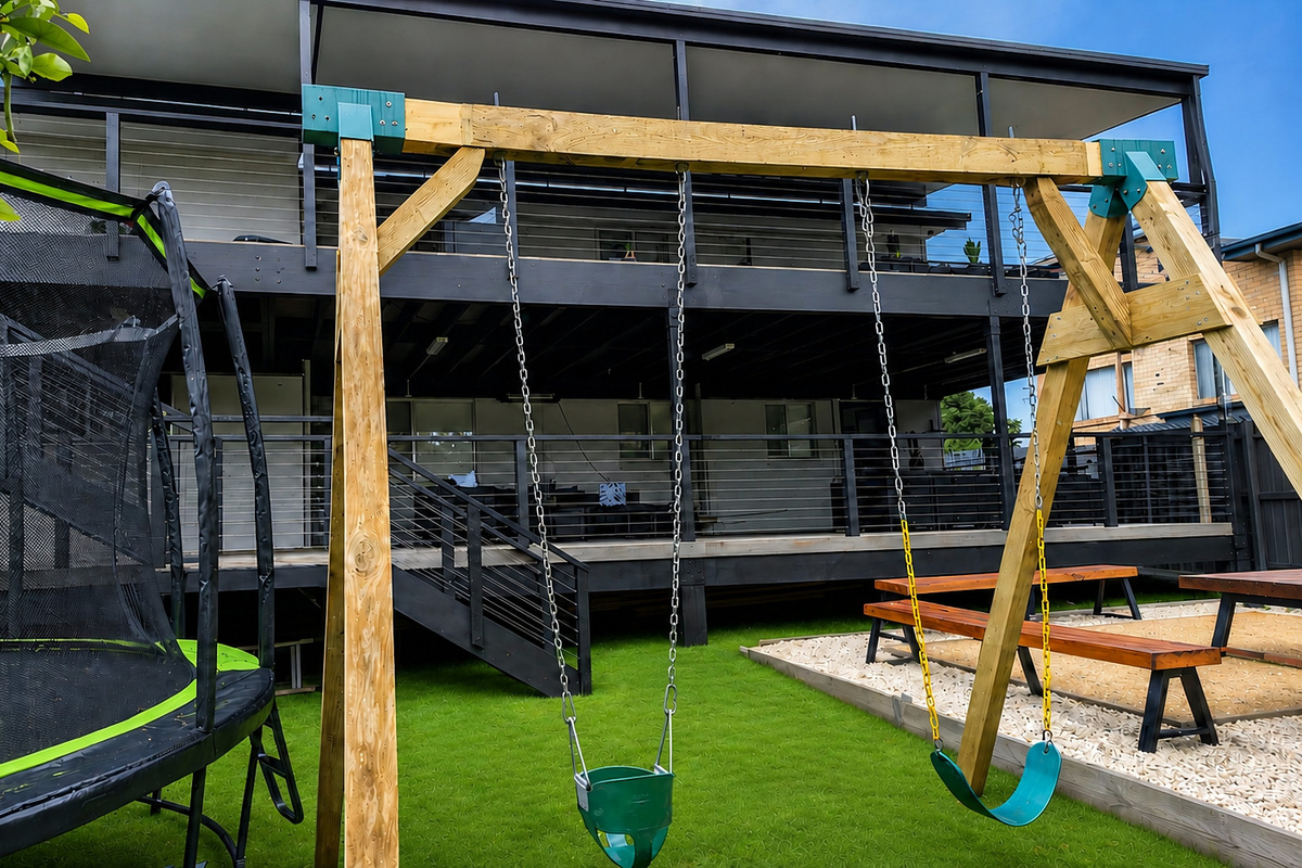 Skye’s Beach House includes a fenced backyard with lawn, garden areas and space connected to the rear entertaining zones.