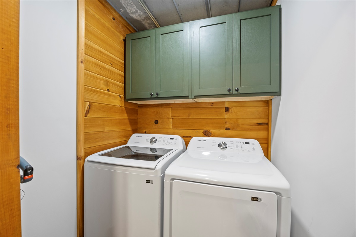 Laundry area with washer and dryer available for guest use.