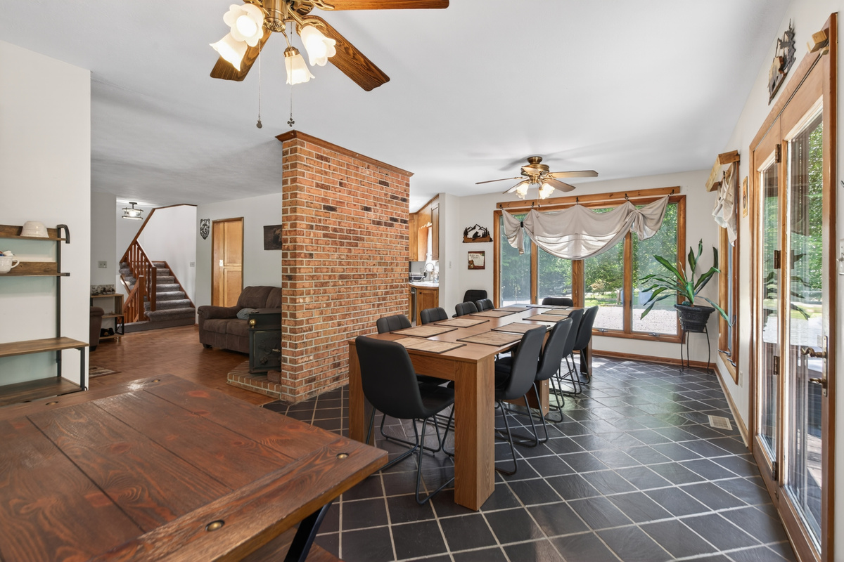 Dining Room: Bright and spacious area perfect for family feasts and laughter-filled gatherings!