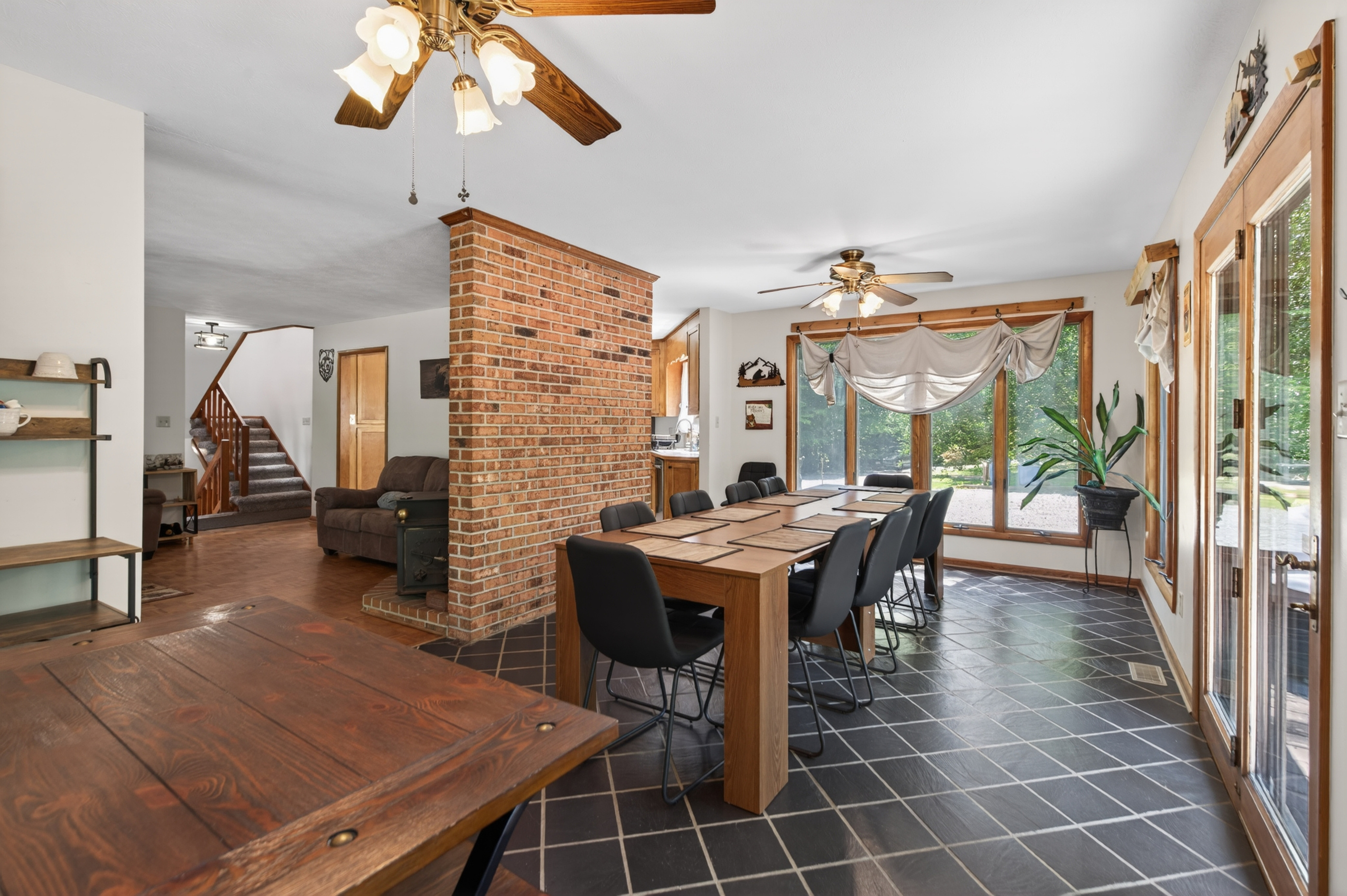 Dining Room: Bright and spacious area perfect for family feasts and laughter-filled gatherings!