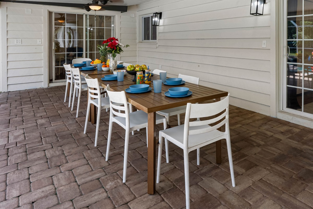 Featuring an extended dining space and poolside seating, this screened enclosure is perfect for both quiet mornings and lively evenings.