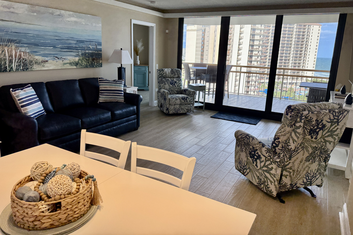 All New Living Room Furniture to include Leather Sofa and Two Recliners