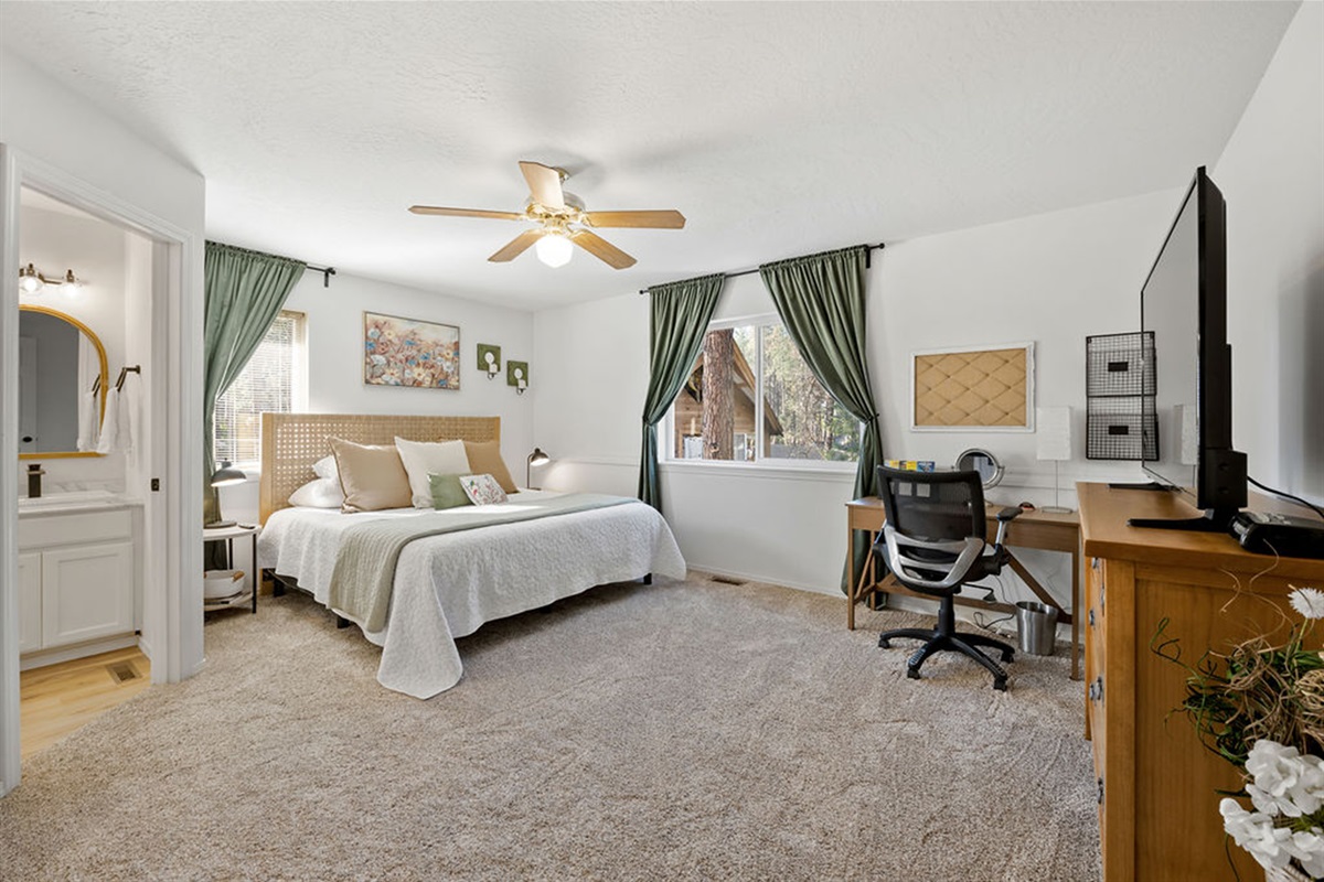 Primary bedroom also has a desk if work simply must be done while on vacation.
