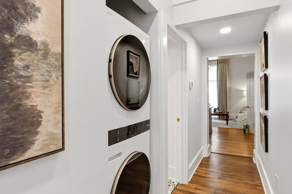 New full-sized stacked washer and dryer in each unit