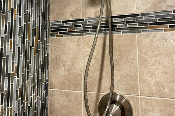 Kohler faucet and removable wand for easy use with multiple shower spray