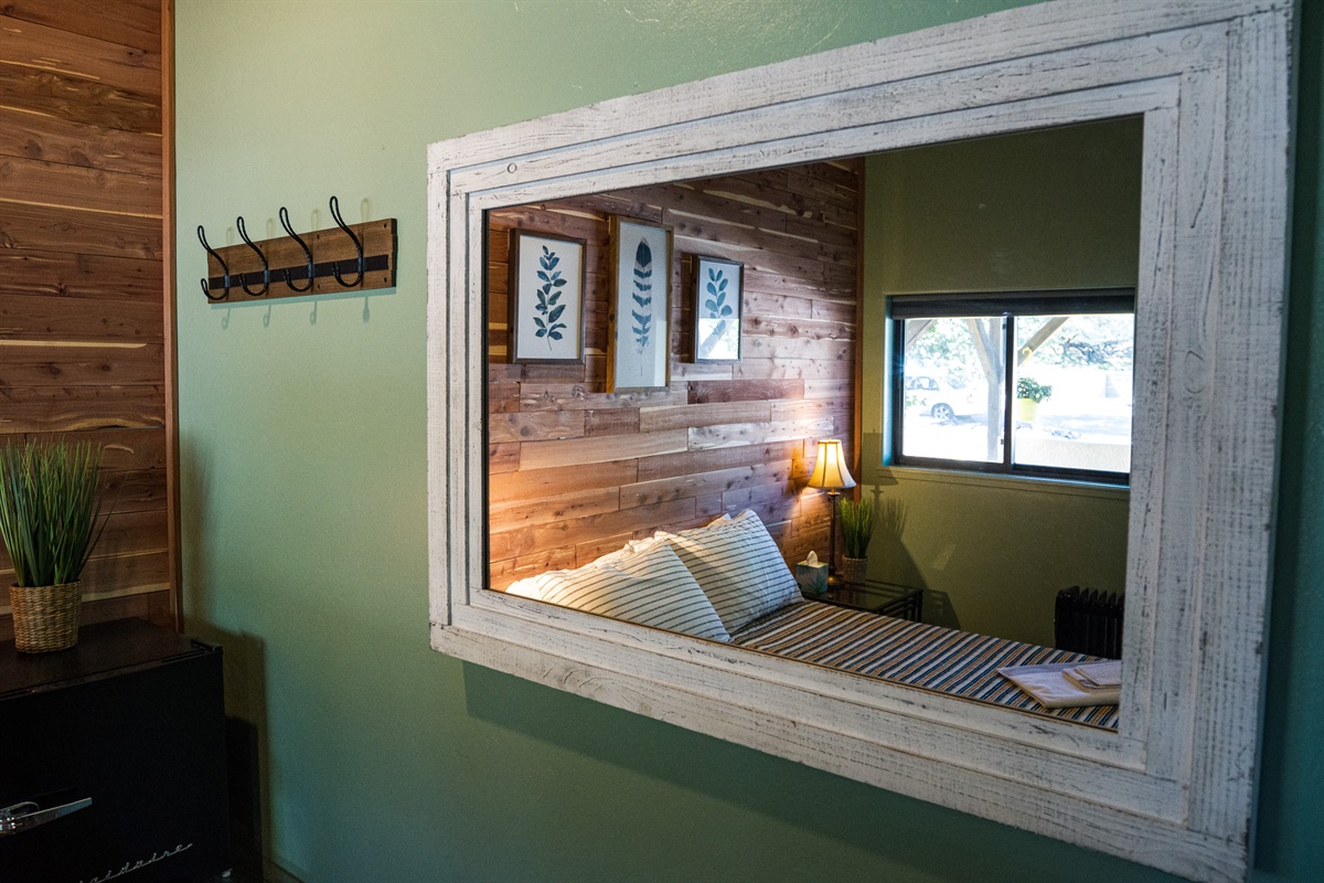 One of two mirrors with convenient hooks for your seasonal gear