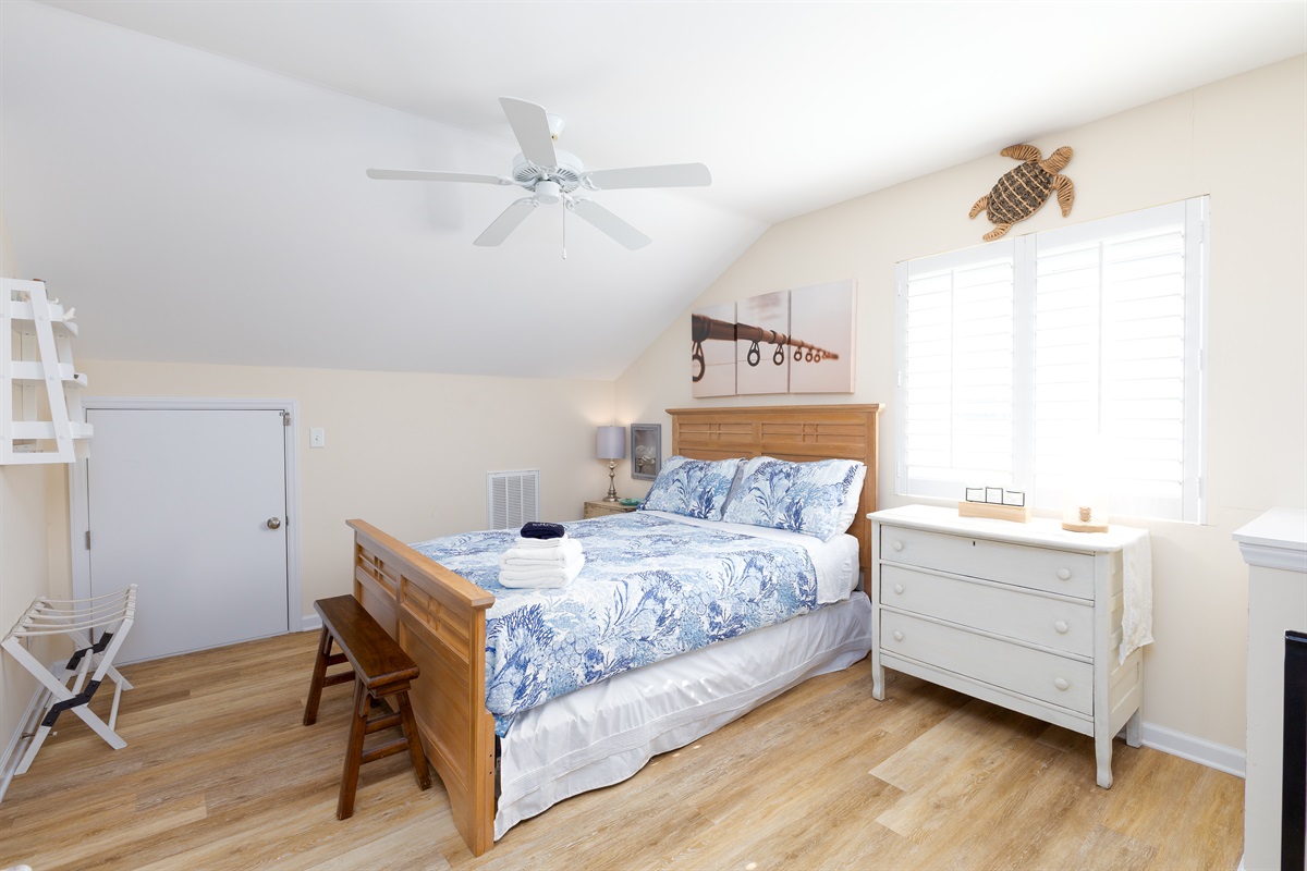 Queen-size bed in Loft bedroom