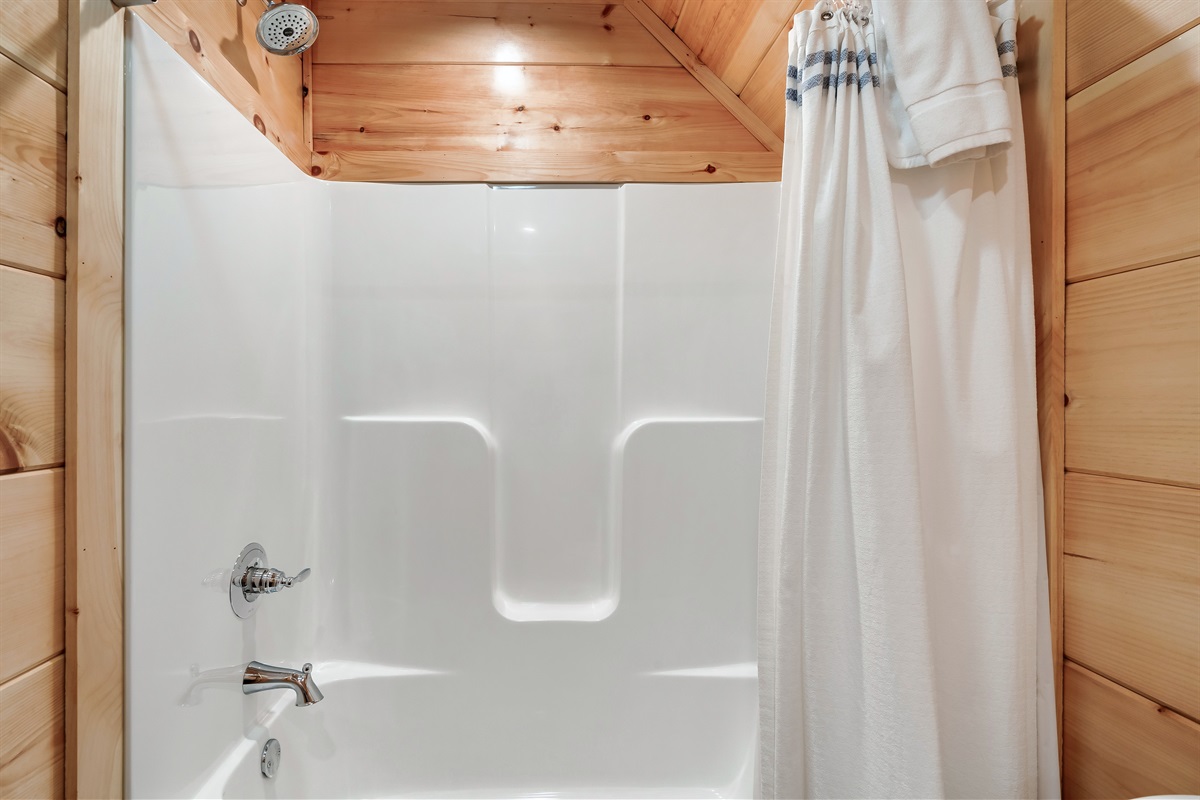 Bathroom with starter supplies and towels. 