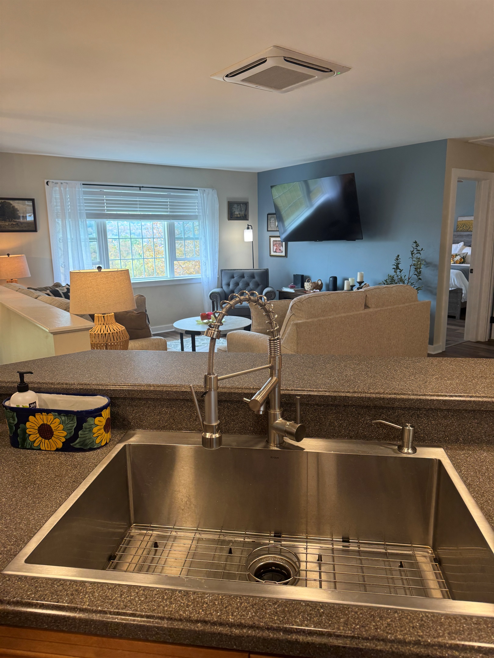 Kitchen with living room beyond