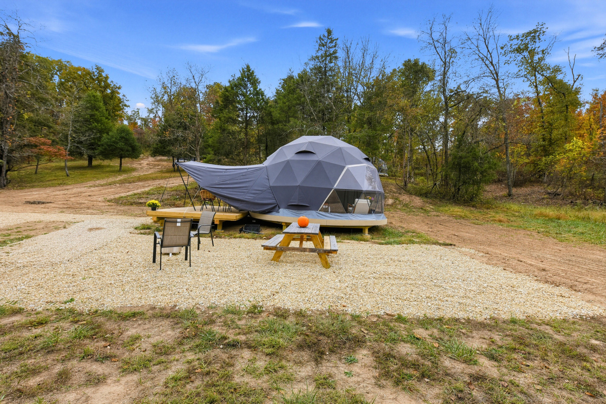 Take in the outdoors from the side of your dome, with your fire pit and picnic table ready for a relaxing evening.