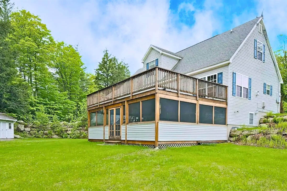 Enclosed porch with a nice hot tub or a big deck for the whole family to hang out on for a cook out this home can fit everyone! 