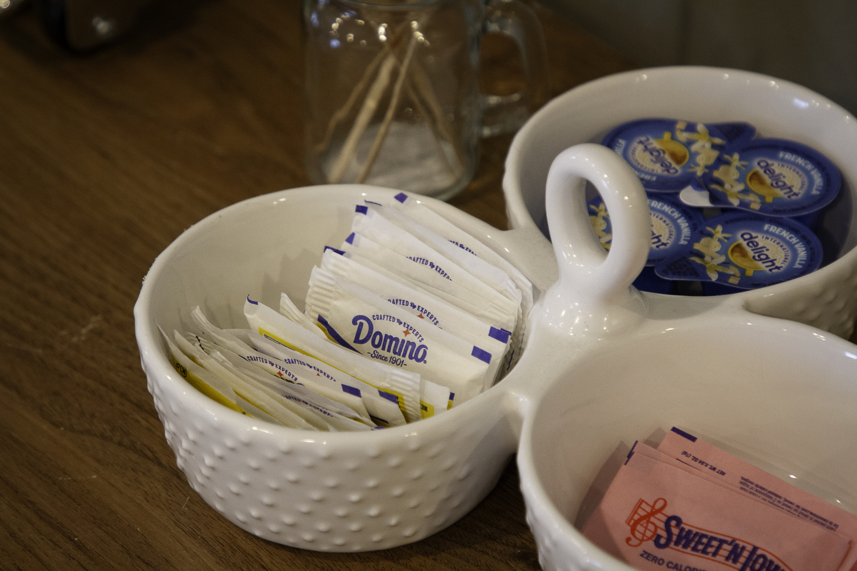A view of the coffee sweeteners and creamer setup