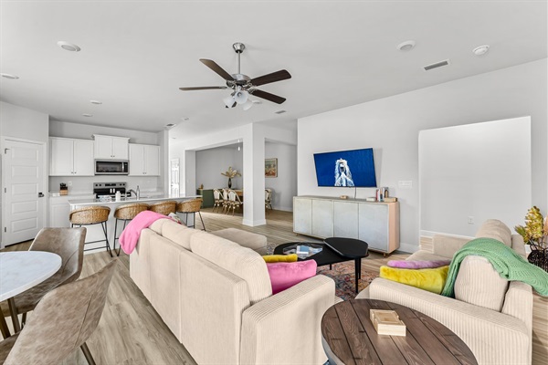 Open concept living makes it easy for everyone to enjoy different parts of the home together