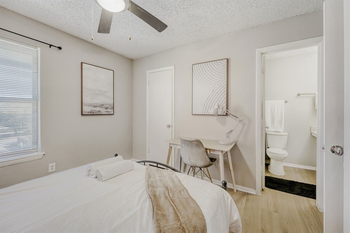 Bright and minimal bedroom with a cozy, modern vibe.