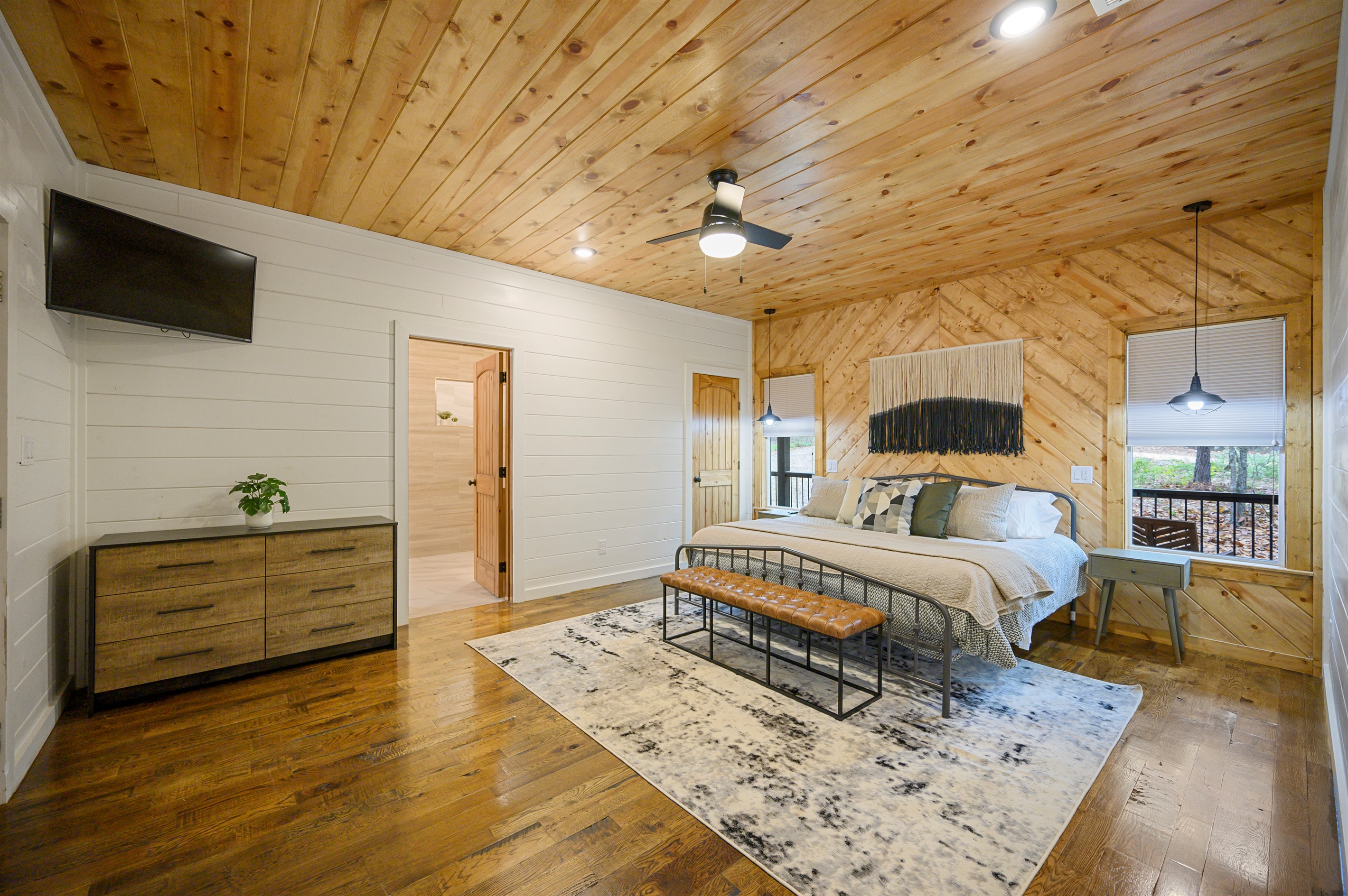 First floor king suite comfort with a peaceful, tucked away feel.
Soft textures, warm wood tones, and your own private ensuite bathroom create the kind of space you’ll look forward to winding down in every night.