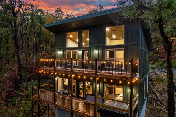 Sunset Ridge at dusk — modern Smoky Mountain retreat with private decks and peaceful wooded views.