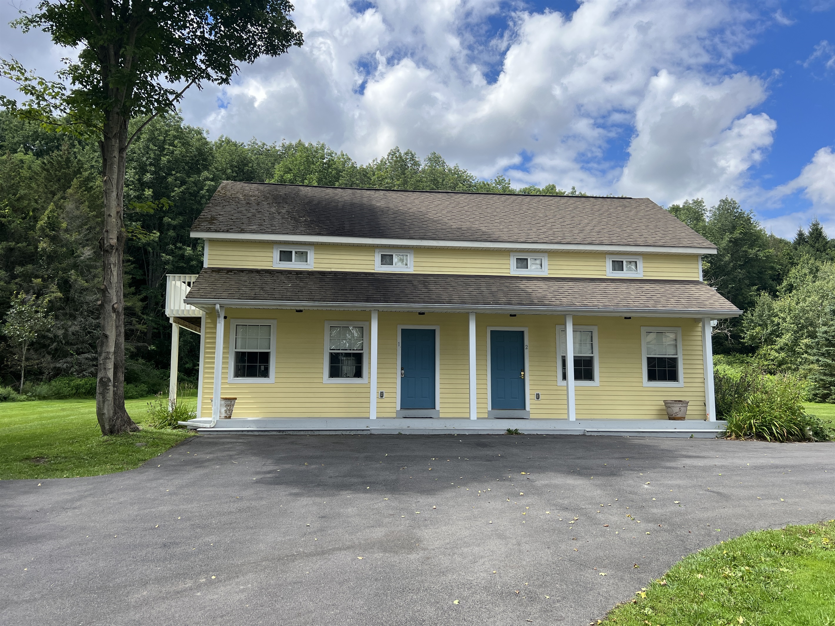 The Federal House Apartment 2 entrance door on the right , apartment 1 on the left.