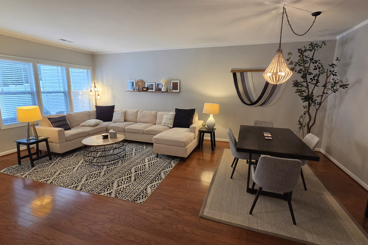 Living room with fireplace and dining area