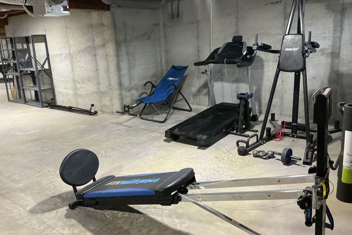 Gym equipment area in basement