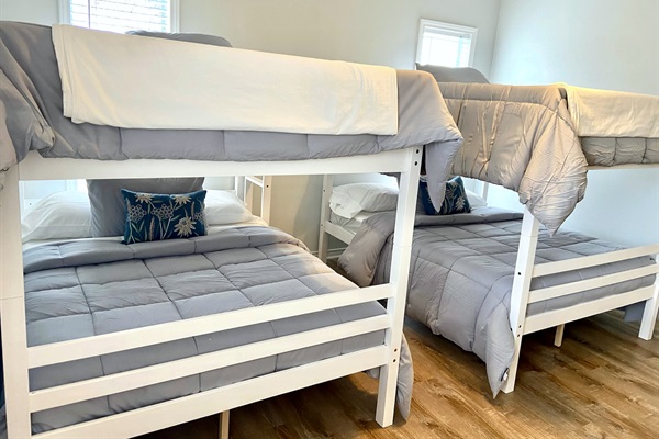 Farmhouse bedroom 1 - 2 full-over-full bunkbeds and a cot