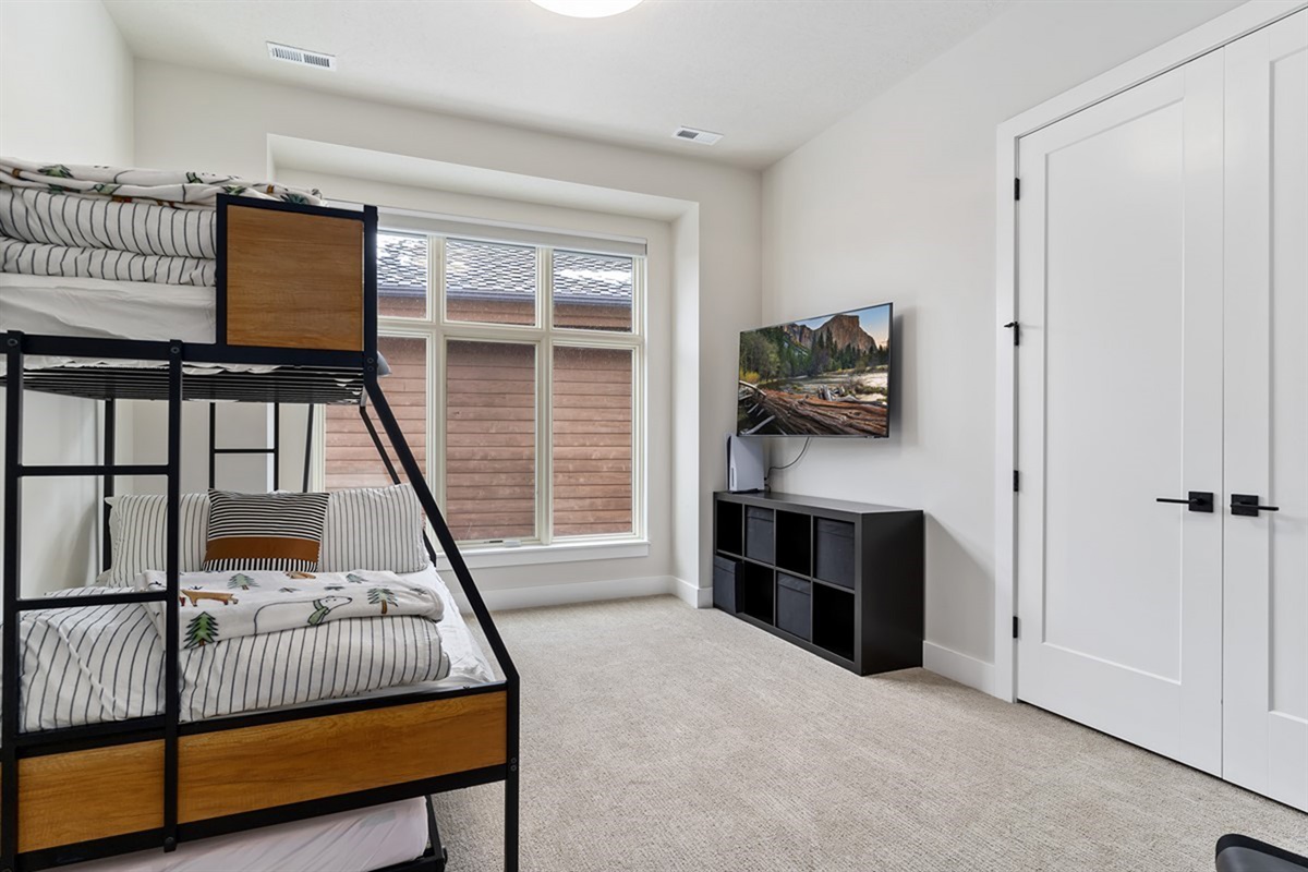 A fun and functional bunk room—perfect for kids or extra guests.