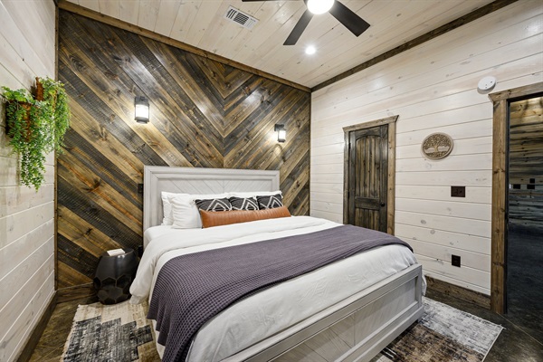 Modern rustic bliss: A designer bedroom with warm, natural timber tones.
