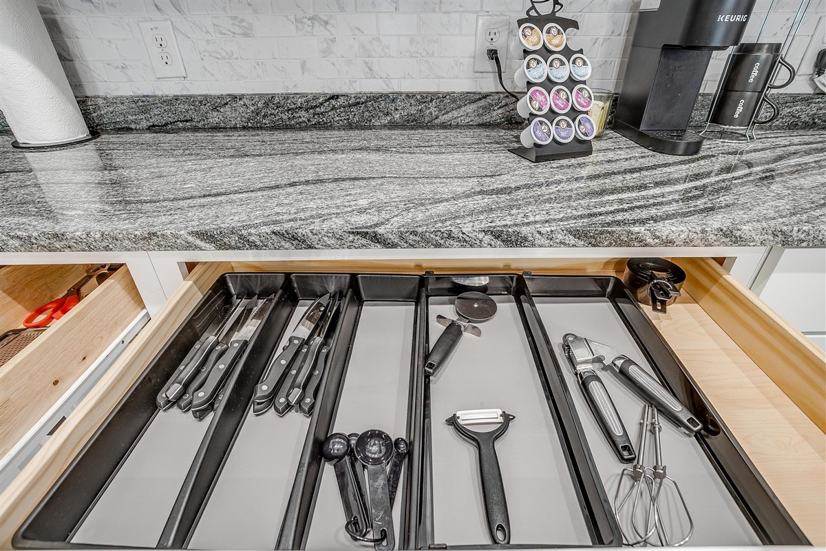 Drawer organized with all essential cooking tools.
