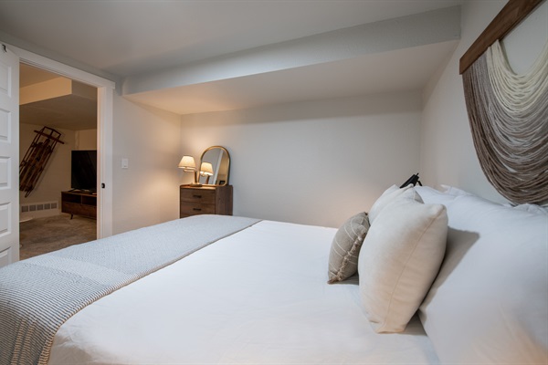 View to theater room from bedroom 5, another queen bedroom with same luxury bed linens and mattress as the rest