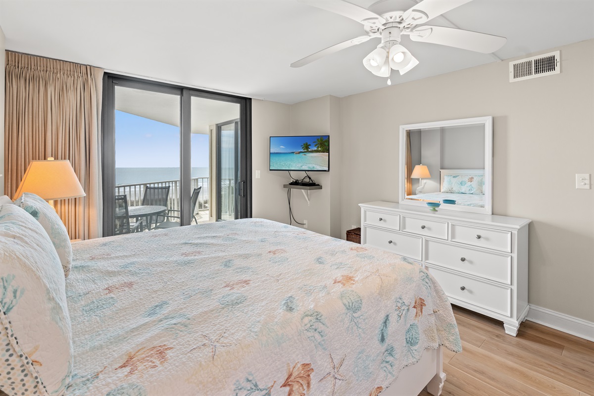 Large Main Bedroom with king bed,  ensuite and oceanfront balcony access