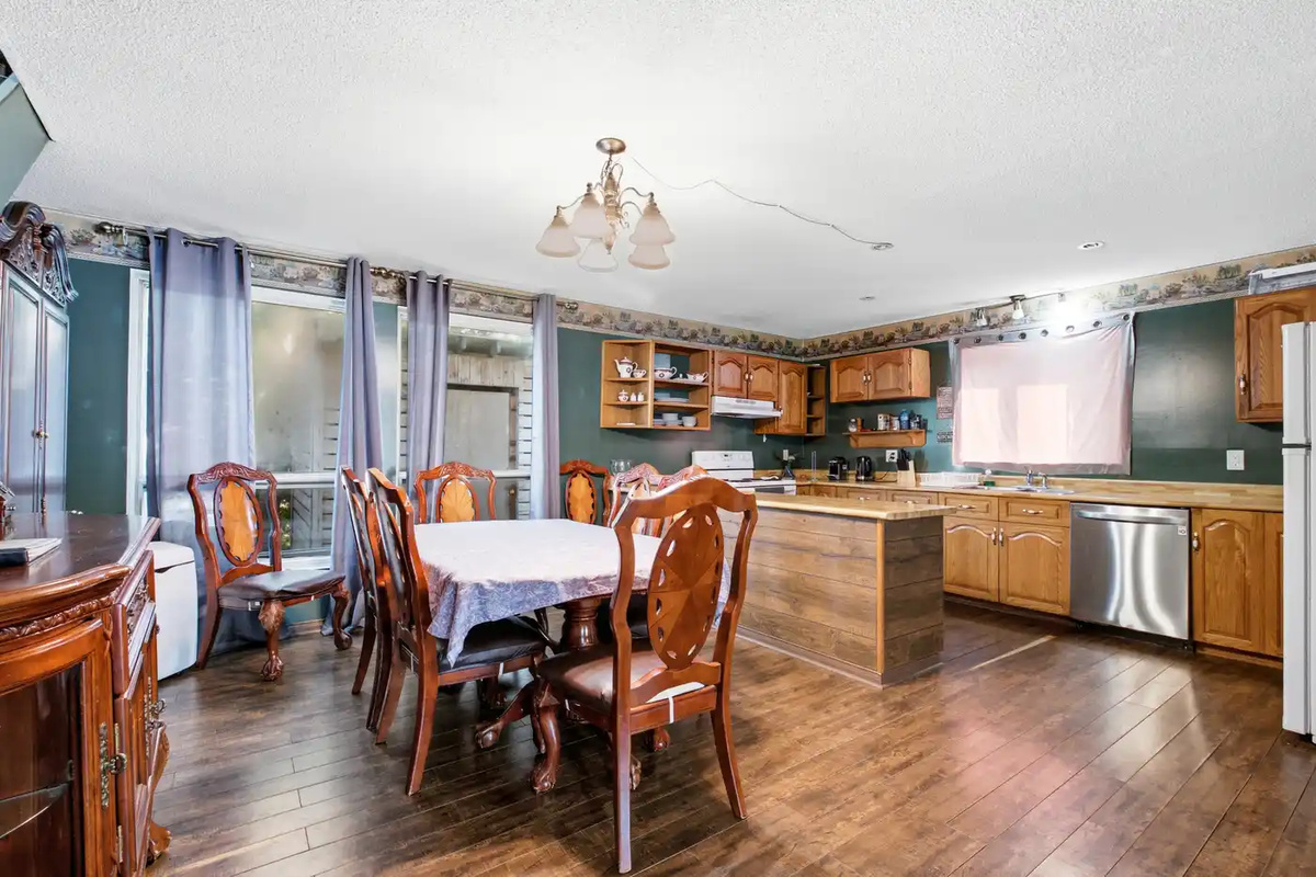 Open kitchen and dining area with plenty of seating