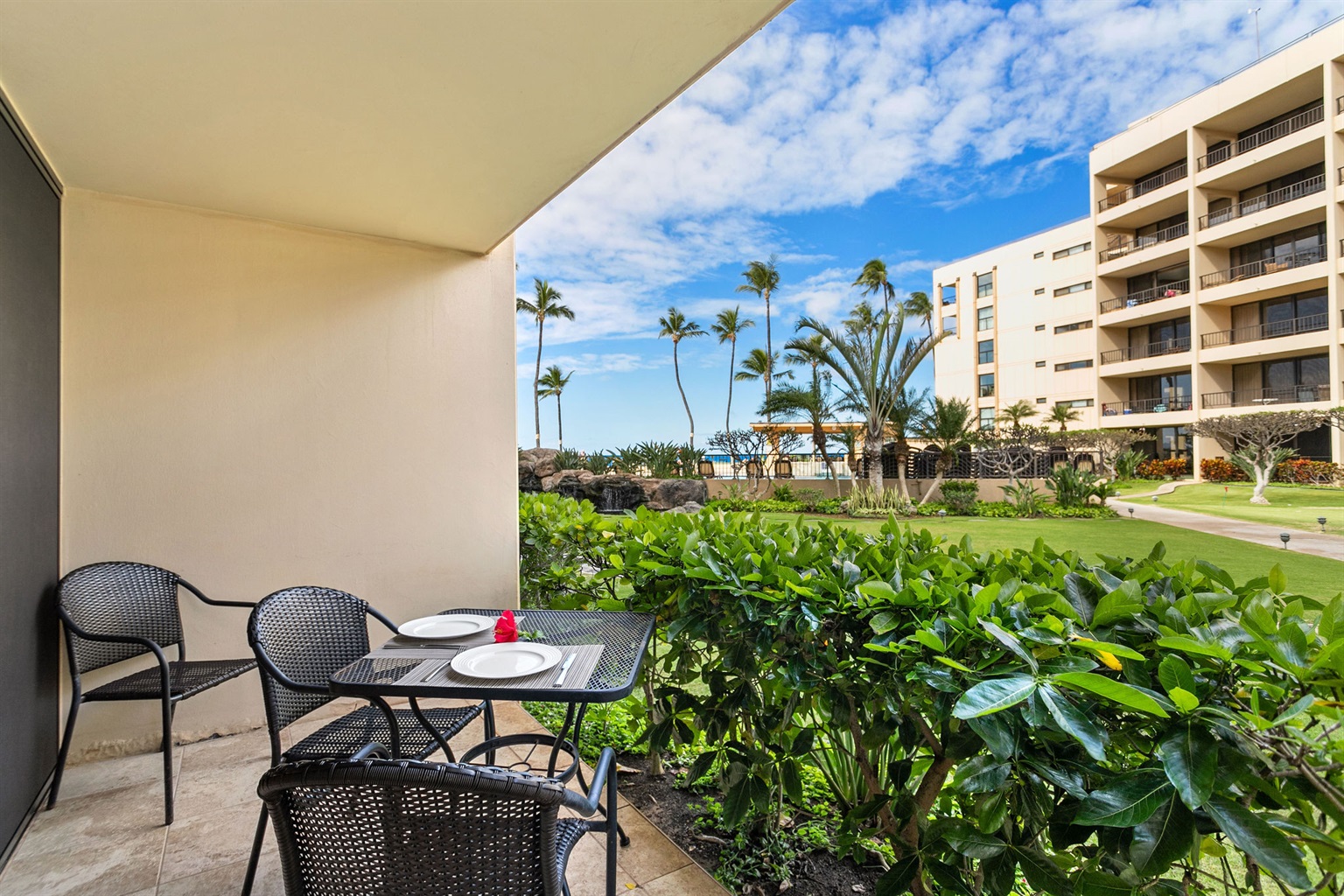 Your groundfloor lanai provides direct access to the lawn for kids to play