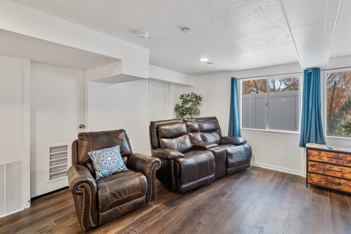 Lounge seats and a recliner in the master bedroom for privacy and/or separate watching TV space for those who can't agree on what to watch.