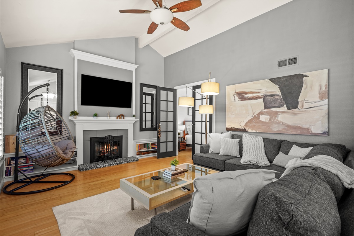 Bright and comfortable living room with cozy seating, an open layout, and a Smart TV perfect for relaxing after a day exploring Napa Valley.