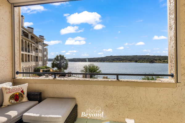 Relax on the private covered balcony with beautiful views across Lake Travis.
