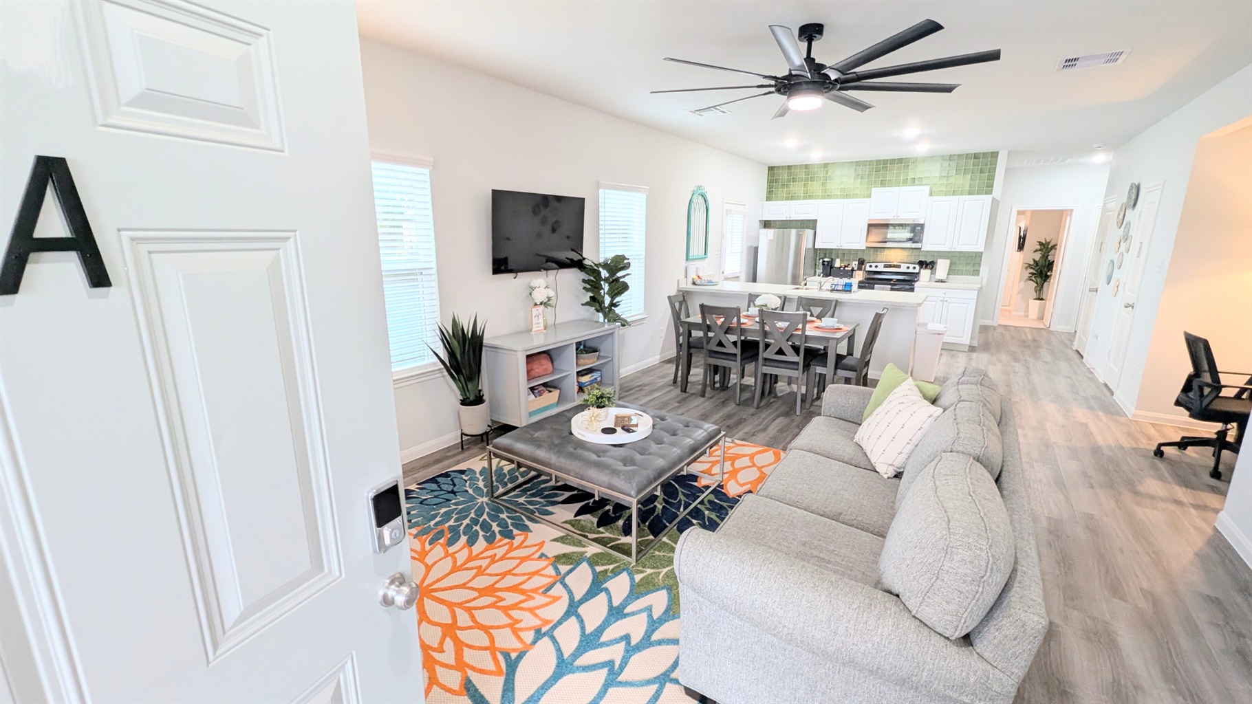 Large, open-concept living, dining, and kitchen area greet you from the step-free doorway making accessibility a breeze.